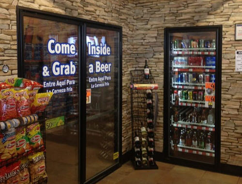 Beer Cave cooler with stone exterior and glass door